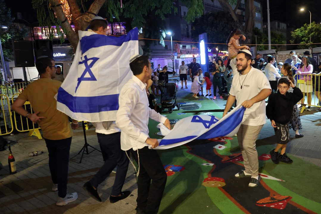 Israeli supporters gather outside the consulate in New York to celebrate the death of Hamas leader Yahya Sinwar, a key figure in the recent conflict